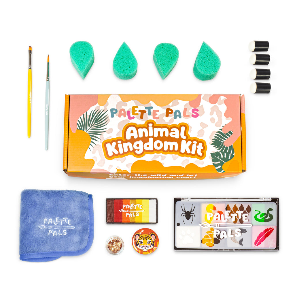 Flat lay of the Animal Kingdom kit: face paint palette, brushes, sponges, reusable stencils and design cards