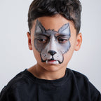 Child wearing a cheetah face paint design from the Animal Kingdom kit
