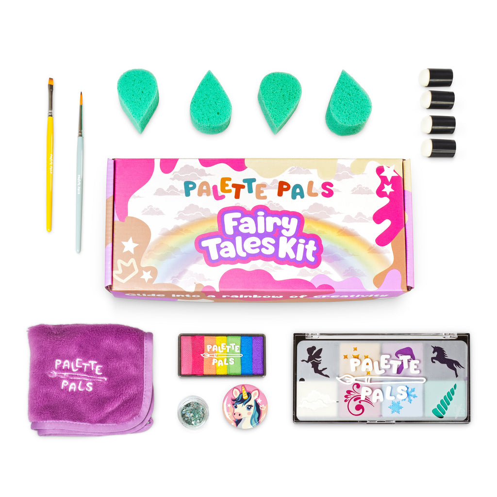 Flat lay of the FairyTales kit: face paint palette, brushes, sponges, reusable stencils and design cards