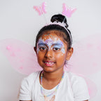 Child wearing a princess face paint design made with the FairyTales kit