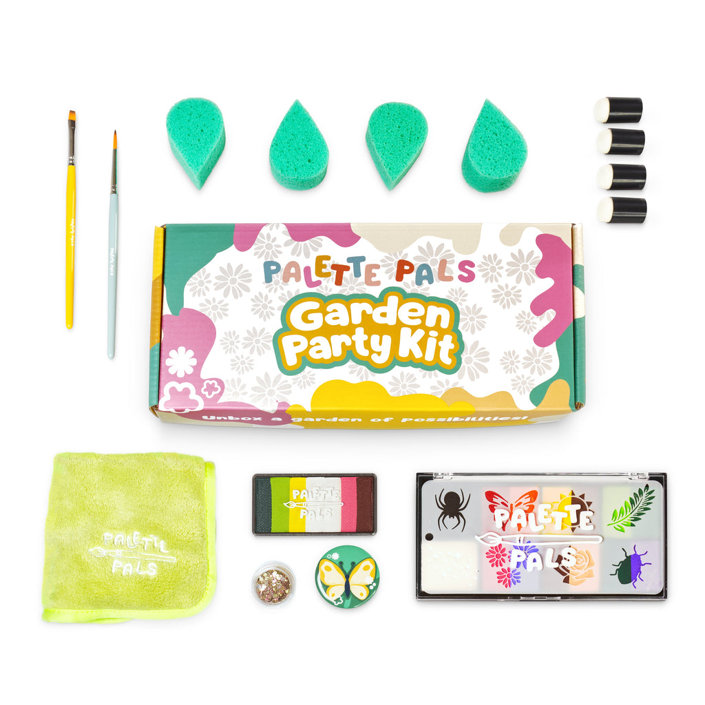 Flat lay of the Garden Party kit: face paint palette, brushes, sponges, reusable stencils and design cards