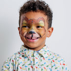 Child wearing a butterfly face paint design created with the Garden Party kit