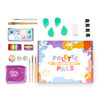 Flat lay of the Imagination kit: face paint palette, one-stroke palette, brushes, sponges, reusable stencils and design cards
