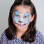 Child wearing a tiger face paint design created with the Imagination kit