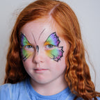 Close-up of the Imagination kit's cosmetic-grade water-based face paints and brushes