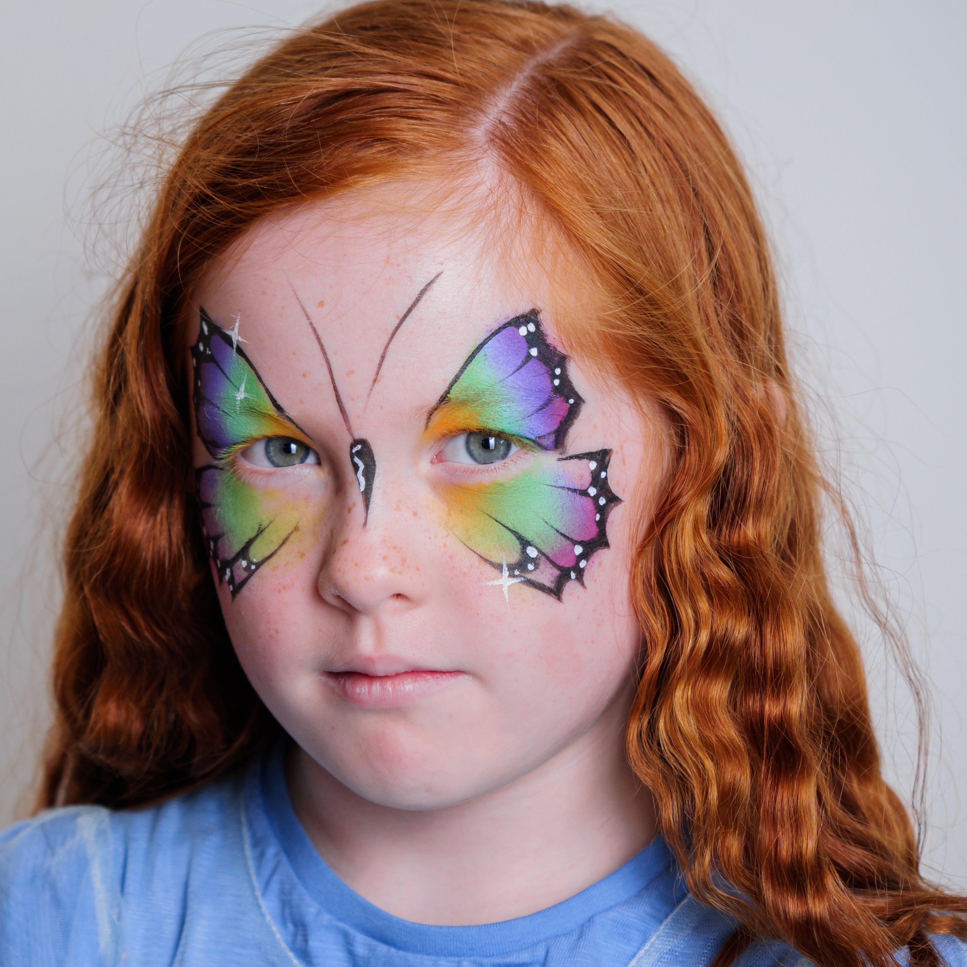Close-up of the Imagination kit's cosmetic-grade water-based face paints and brushes