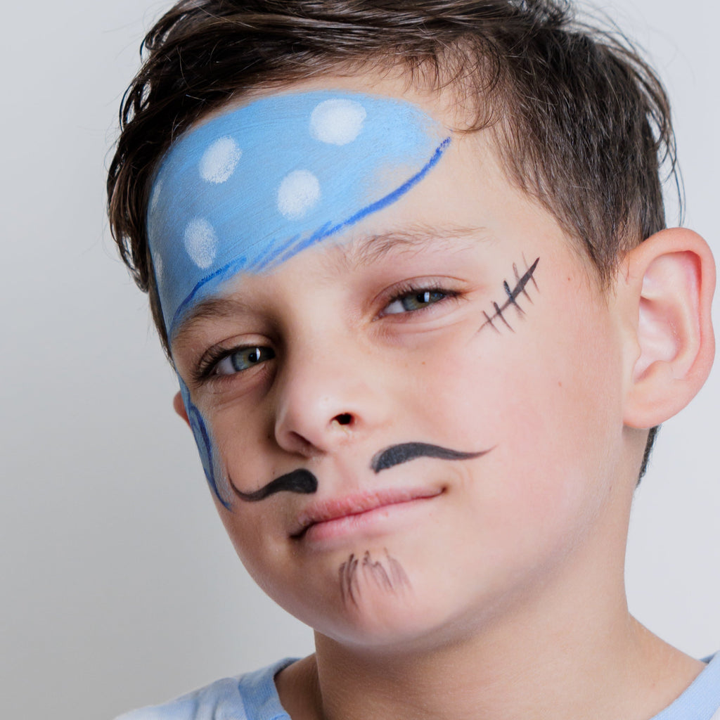 Child wearing a dolphin face paint design from the Oceans Adventure kit