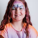 Close-up of the Oceans Adventure kit's water-based face paints, glitter and brushes