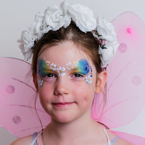 Child wearing a fairy face paint design from the FairyTales kit