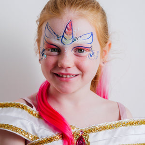 Close-up of the FairyTales kit's water-based face paints, glitter and brushes